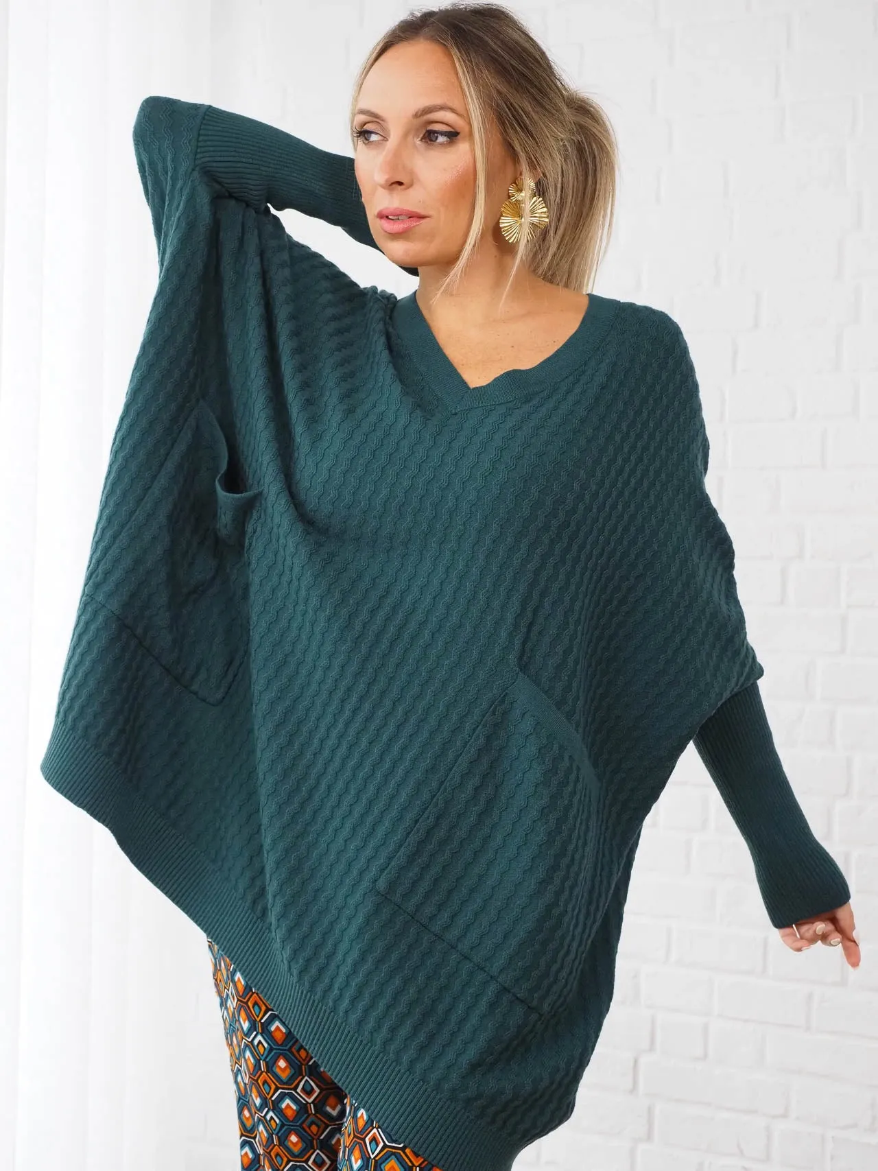 CAMISOLA DE MALHA OVERSIZED COM BOLSOS