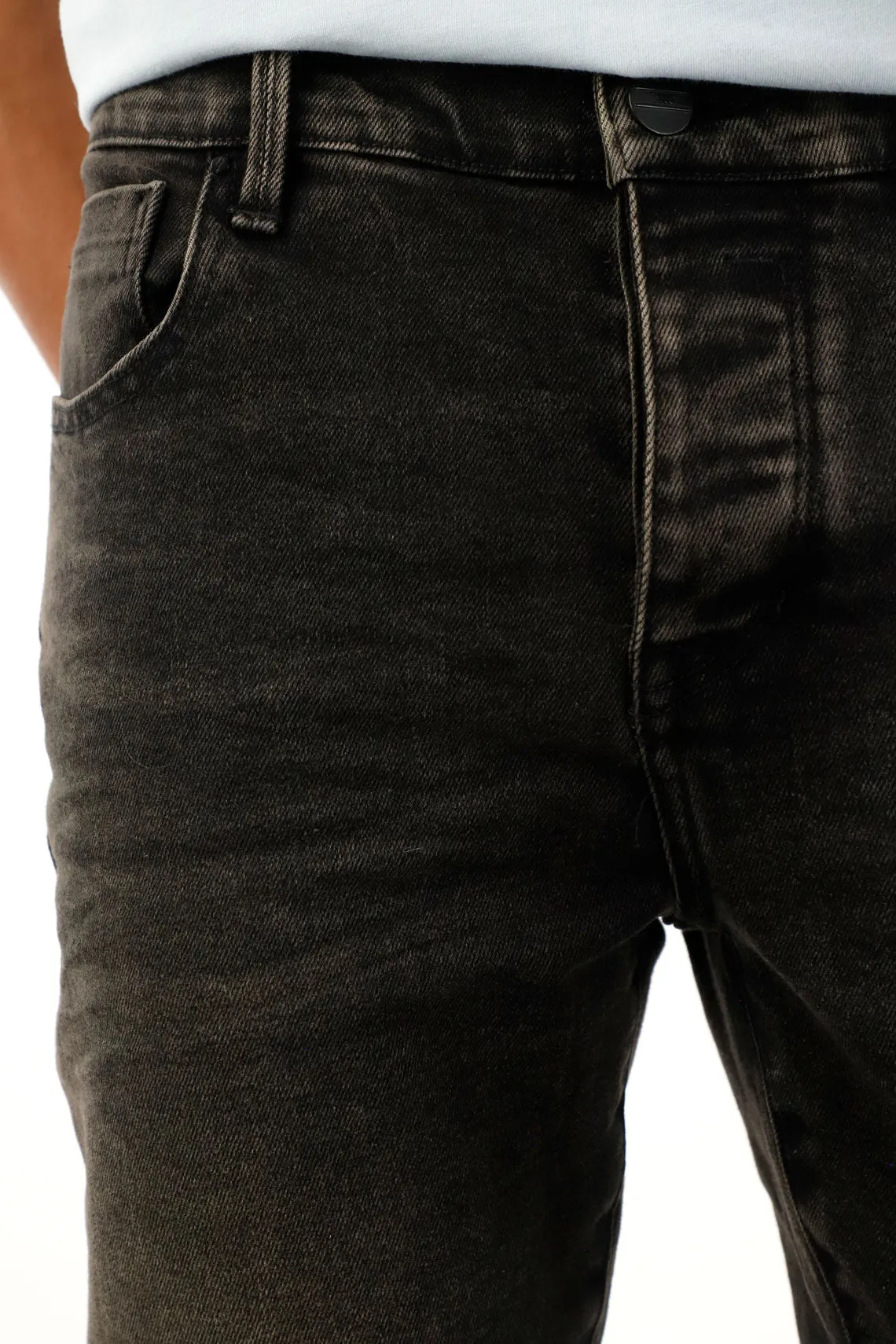 Jean Skinny negro de tiro medio para hombre